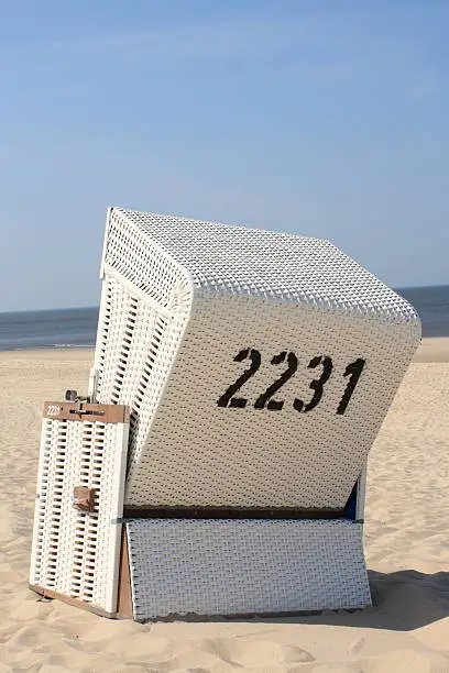 beachchair on white sandy beach