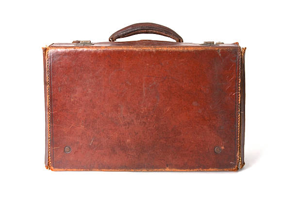 istock Vintage brown leather suitcase isolated on white 155245533