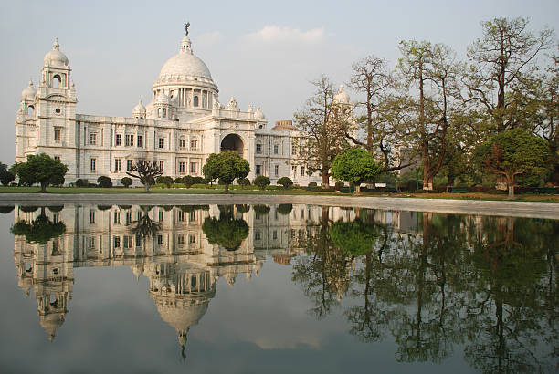 Taken on 26/12/2011 night from main entrance- The Victoria Memorial (Victoria Memorial Hall) is a large marble building in Kolkata (Calcutta), West Bengal, India which was built between 1906 and 1921. It is dedicated to the memory of Queen Victoria (1819–1901) and is now a museum and tourist destination under the auspices of the Ministry of Culture. The Memorial lies on the Maidan (grounds) by the bank of the Hooghly river, near Jawaharlal Nehru road. King George V, laid the foundation stone on 4 January 1906 and it was formally opened to the public in 1921.