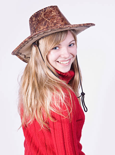 istock girl in a cowboy hat 155246737
