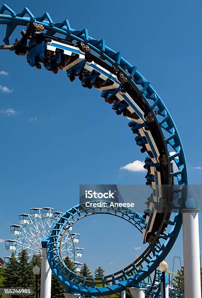 Corkscrew Rollercoaster Stock Photo - Download Image Now - Rollercoaster, Amusement Park, Amusement Park Ride