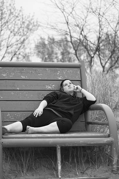 istock Young Adult on Chair at Beach 155247595