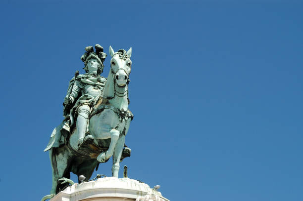 Silhouette of statue of King Jose statue in the Praca da Figueira square in Lisbon, Portugal