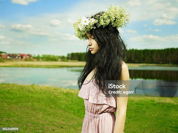 Beautiful Girl Wearing A Wreath Of Wildflowers Stock Photo - Download Image Now - 20-24 Years, 20-29 Years, Adult