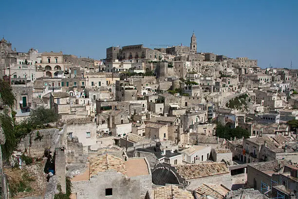 Cityscape view of Sassi di Matera, toward sasso Barisano, during a summer sunny day.