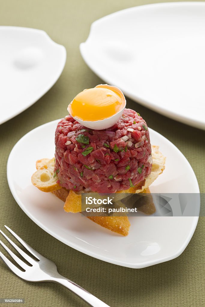 Tartar beef tartar with bread and egg Appetizer Stock Photo