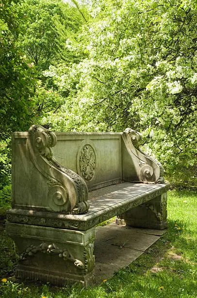 This beautiful old stone bench suggests such serenity and tranquility on a summers day.