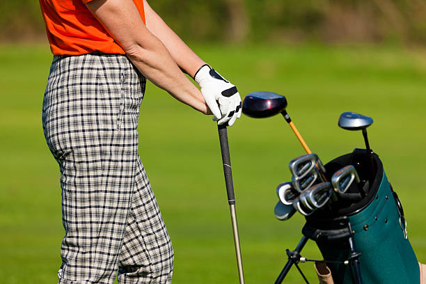 istock Mature Woman playing golf 155251662