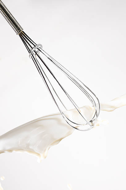 istock Steel whisk in splash of milk 155251906