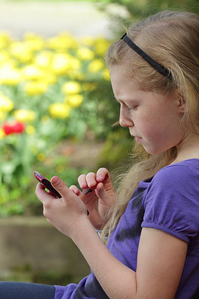 istock girl with fon 155252671