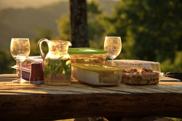 istock Food and drink on a wooden table in nature 1552531815