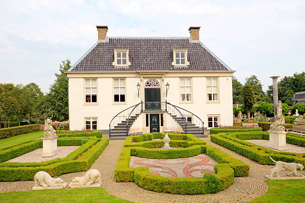 istock Traditional medieval mansion with beautiful garden in the Netherlands 155253665