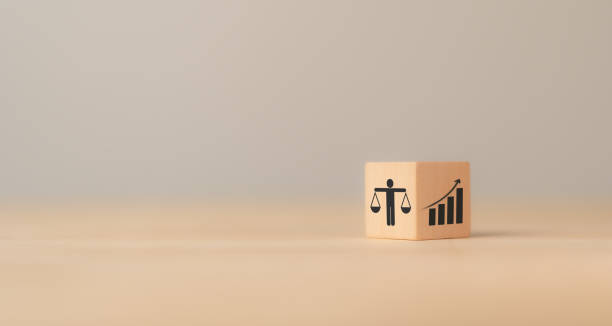 istock Business ethics, corporate growth and sustainability concept. Business ethics, environmental ethics, applied ethics, and sustainable development. Wood  blocks with ethical and corporate growth icon. 1552552541