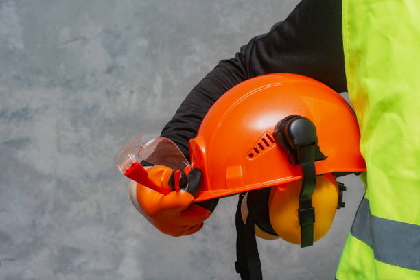 istock Protective goggles for eyes and construction helmet for head with. Construction tool and form for protection. 1552558056