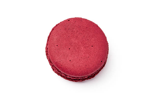 istock Top view of red macaron isolated on white background. circle shape. 1552561751