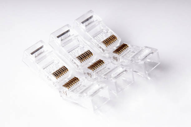 istock Close up of Network and ethernet cable isolated on white background. Modular plugs. LAN Cable. 1552584276