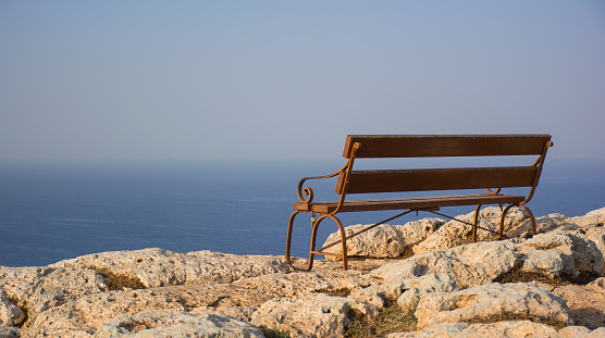 Beautiful wooden bench with seaview on the Cape Greco, Cyprus.