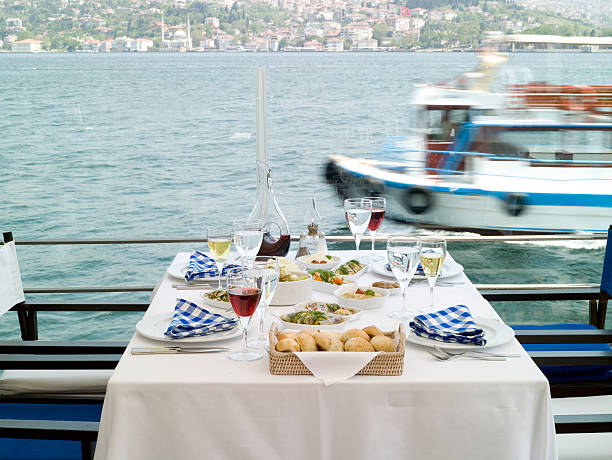 istock romantic  sea side restaurant at Bosphorus istanbul 155259094