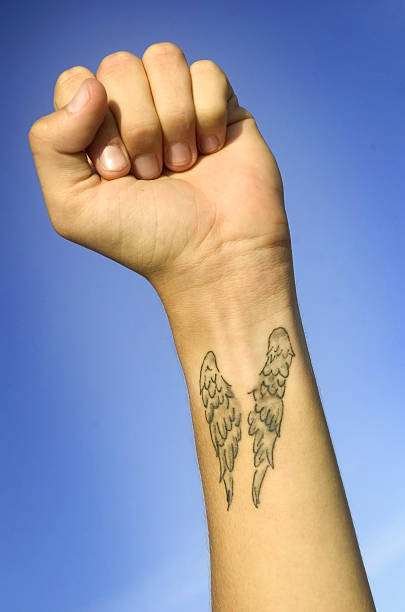 Tattoo On The Arm Stock Photo - Download Image Now - Tattoo, Animal Wing,  Angel - iStock