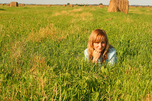 liing girl in field stock photo