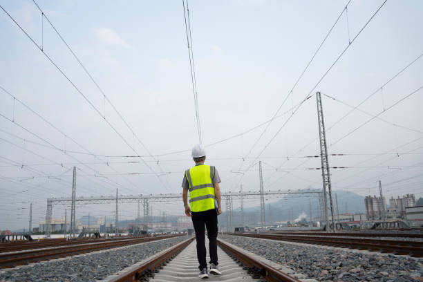 istock Young railway workers are inspecting the tracks 1552601425