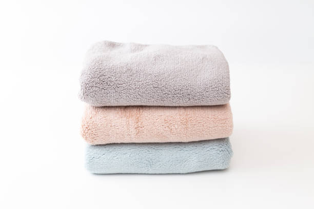 istock Towels stacked on a white background. 1552602362