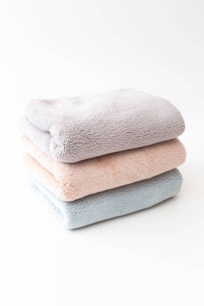 istock Towels stacked on a white background. 1552602617