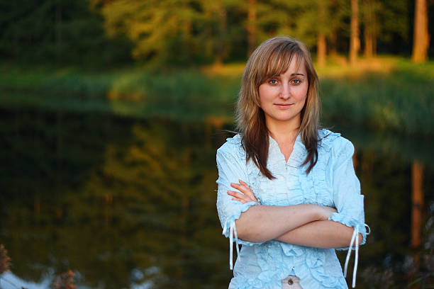 woman on lake stock photo