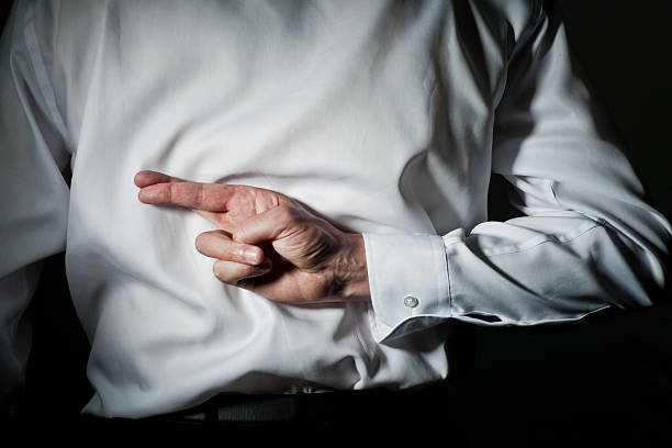 istock Fingers crossed - shirt 155260511