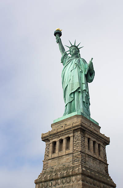 istock Statue of Liberty  in cloudy weather 155260572