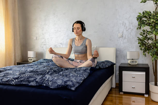 istock A young sportswoman is doing morning exercise at home. 1552607691