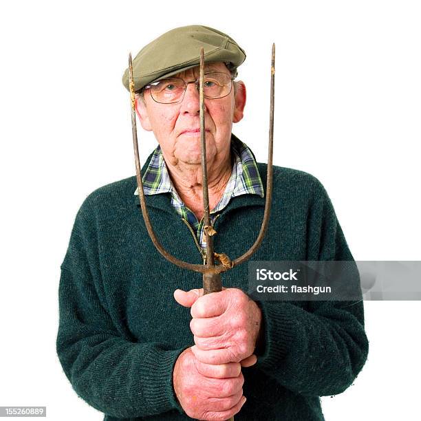 Senior Hombre Con Paso De Horquilla Foto de stock y más banco de imágenes de Adulto - Adulto, Adulto maduro, Agricultor