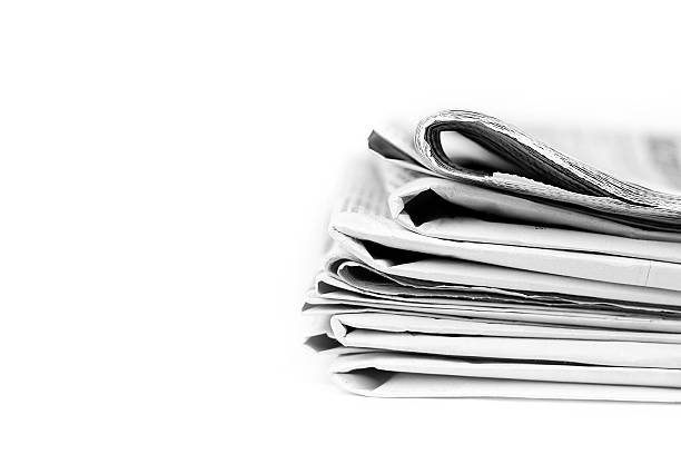 istock Stack of isolated newspapers in black and white 155261257