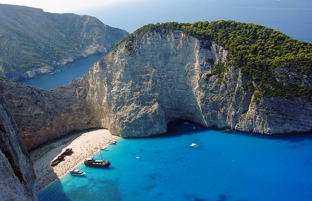 istock boats and shipwreck beach at Zakynthos island 155262622
