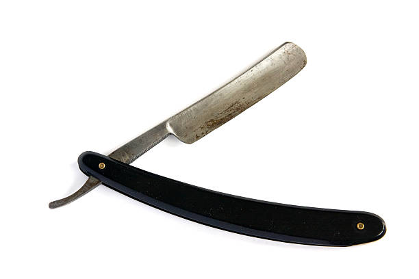 istock Vintage shaving razor blade isolated 155264060
