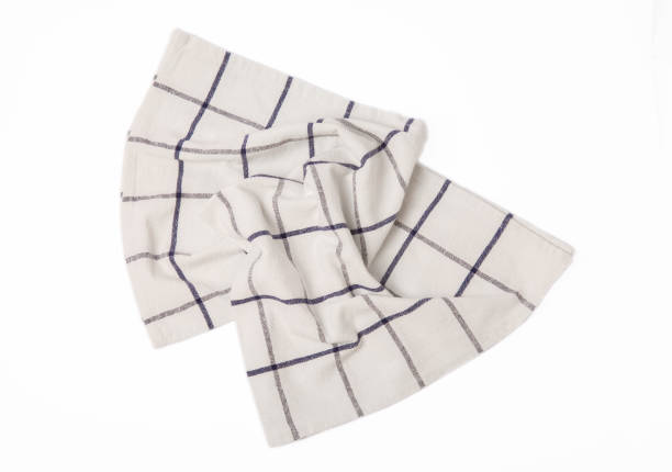 istock Kitchen towel .Cotton napkin isolated on white background. Picnic towel. Home textiles. Folded cloth.Food serving design element. Square napkin. 1552643757