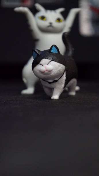 istock action figure cats with black background 1552649667