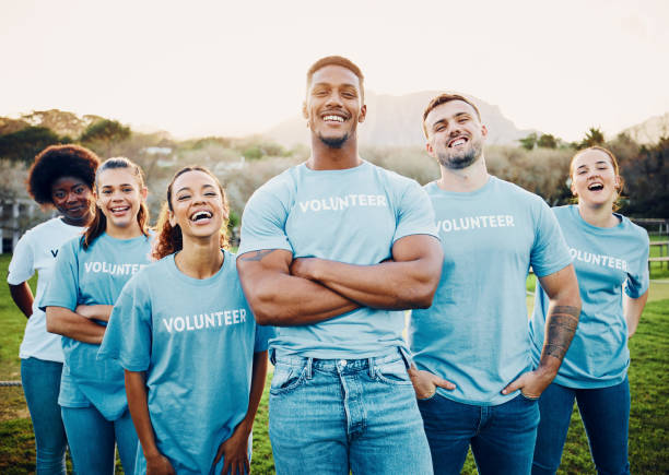 istock Volunteer group, teamwork and community service, eco friendly help with people in portrait, solidarity and sustainability, Happy, environment and sustainable development with volunteering to clean 1552651306