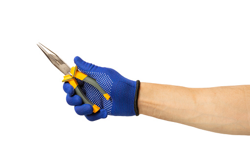 Electrician. Electrician's hand with tools isolated on white background. Electrician's tool. workforce. Yellow and black pliers in the hands.