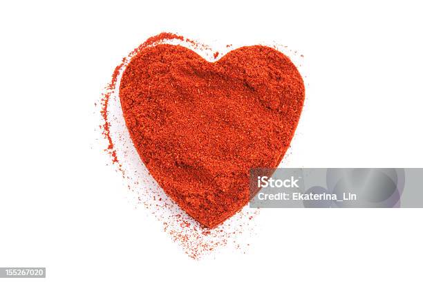 Pile Of Ground Paprika Isolated In Heart Shape On White Stock Photo - Download Image Now