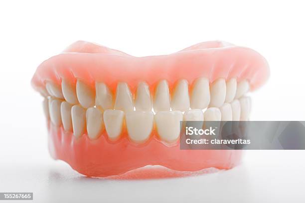 Tooth Being Inverted Teeth Prosthetics Upside Down Against White Background Stock Photo ...