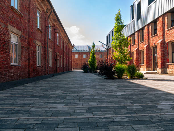 istock Modern cafe workspace exterior loft style red brick wall Old industrial buildings renovation Urban space Break-out areas 1552687754