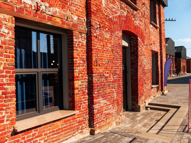 istock Modern cafe workspace exterior loft style red brick wall Old industrial buildings renovation Urban space Break-out areas 1552687755