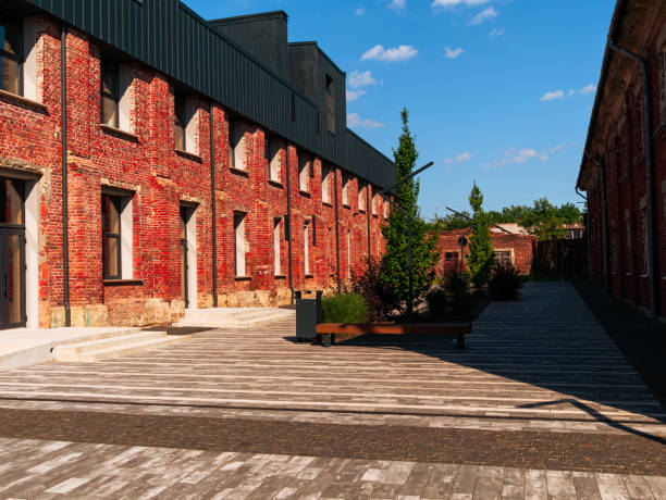 Modern cafe workspace exterior loft style red brick wall Old industrial buildings renovation Urban space Break-out areas