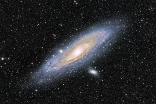istock galaxy with a big barred disk and white stars in the background 1552698890