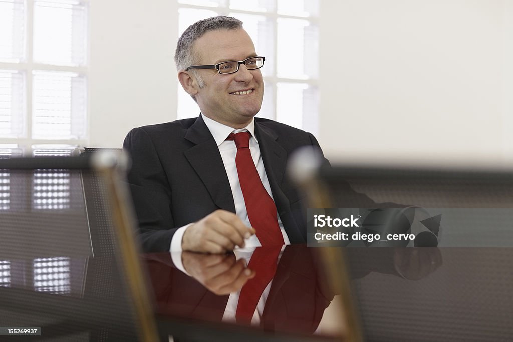 Empresário em reunião corporativa - Foto de stock de 40-49 anos royalty-free