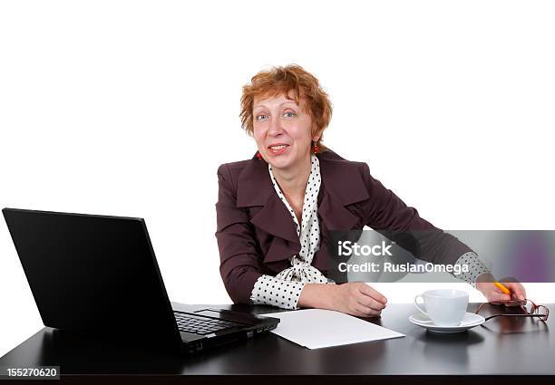 Middleaged Woman At The Table Stock Photo - Download Image Now - Adult, Adults Only, Business