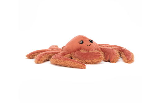 crab plushie doll isolated on white background with shadow. Plush stuffed puppet on white backdrop. Fluffy crab toy for children. Cute furry animal plaything for kids