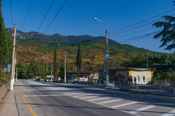 istock Bus stop on mountain transport route 1552716945