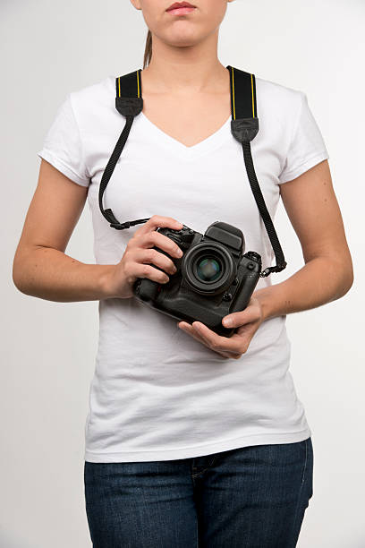 Young female with a camera stock photo